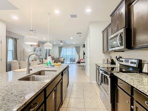 Fridge, microwave, oven, stovetop - Windsor at Westside Stunning 7BR Villa, Pool/Spa (Kissimmee)
