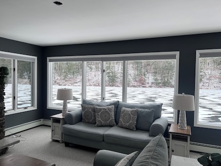 Smart TV, fireplace. Escape to a stunning two-story home nestled on serene Esopus Creek in Saugerties