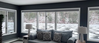 Escape to a stunning two-story home nestled on serene Esopus Creek in Saugerties