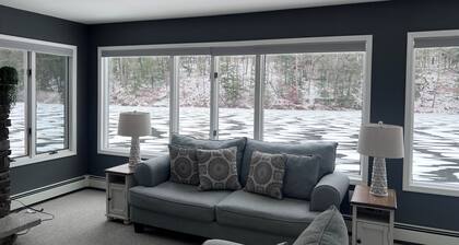 Escape to a stunning two-story home nestled on serene Esopus Creek in Saugerties