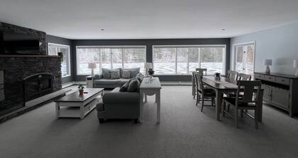 Escape to a stunning two-story home nestled on serene Esopus Creek in Saugerties
