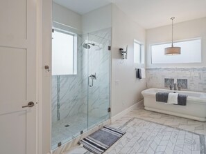 Jetted tub, hair dryer, towels, soap