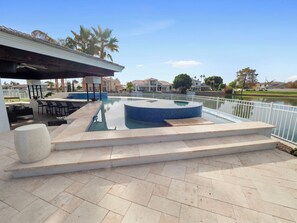 Outdoor pool, a heated pool - This GORGEOUS custom home is located on 3/4 acre waterfront in Gilbert Arizona (Gilbert)