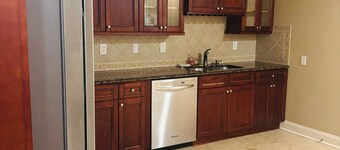 2 Bed Basement Apt in Upscale Gated Community By Stores, Restuarants, & Parks