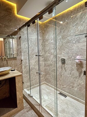 Shower, hair dryer, towels, soap