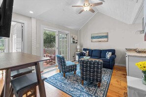 Townhome, Multiple Beds, Kitchen, Garden View (Vineyard Sound Retreat) | Living area | 42-inch flat-screen TV with digital channels