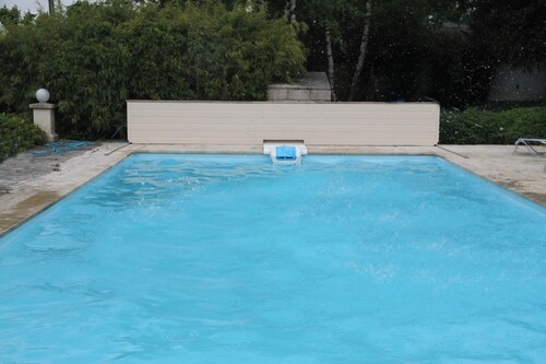 House with swimming pool and garden