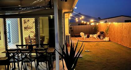 Relax at this Hampton style Beach House 3 min drive to the centre of everything.