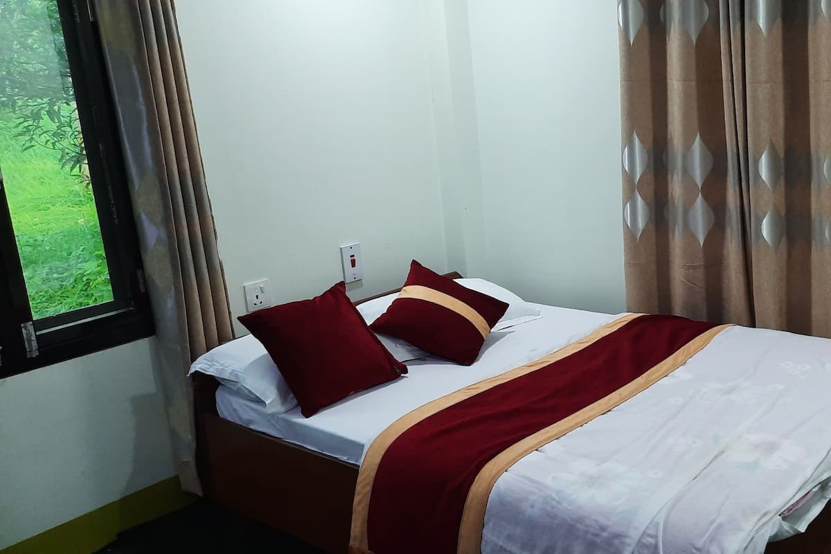 Chambre simple Deluxe, vue sur le jardin | AccĂšs au Wi-Fi (inclus)