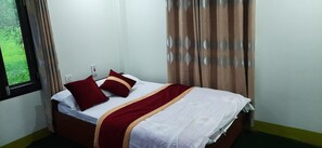 Deluxe Single Room, Garden View | Free WiFi - Tharu Mango Garden Resort (Kohalpur)
