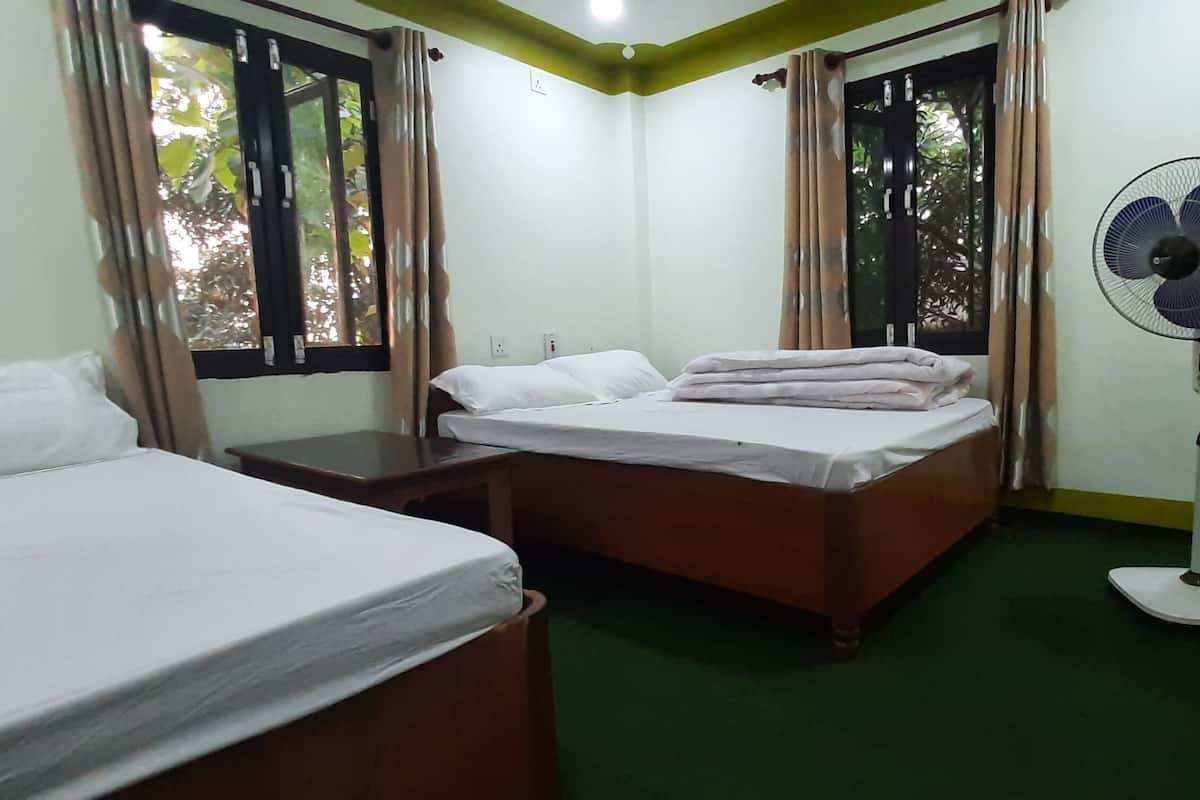 Chambre économique double ou avec lits jumeaux, vue sur le jardin | AccÚs au Wi-Fi (inclus)