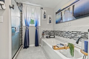 Shower, hair dryer, towels, soap