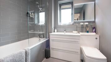 Hair dryer, towels, soap, shampoo