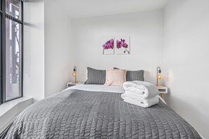 2 bedrooms, desk, iron/ironing board, travel crib