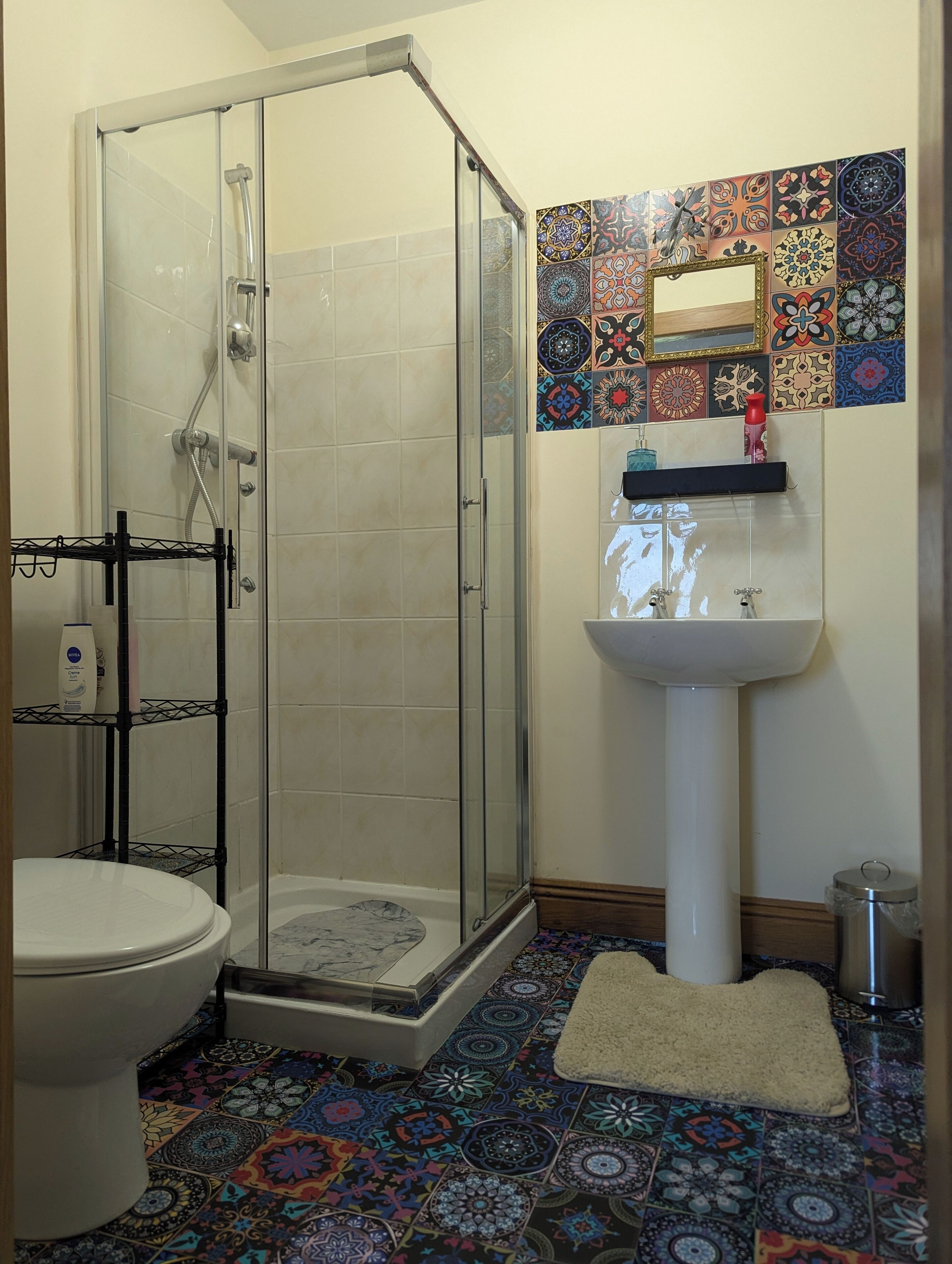 Shower, towels, soap, toilet paper