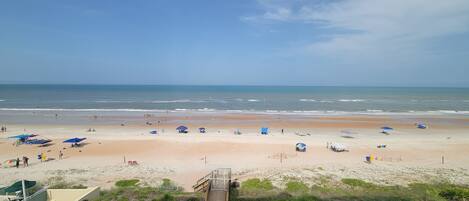 On the beach, sun-loungers, beach towels