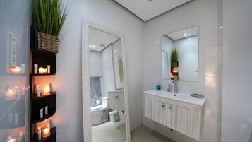 Hair dryer, towels, soap, toilet paper