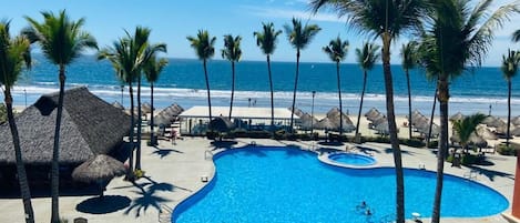 Outdoor pool, open 9:00 AM to 10:00 PM, sun loungers