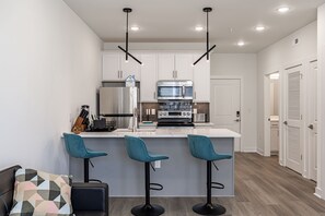 Toaster, cleaning supplies, paper towels