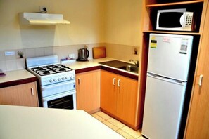 Cribs/infant beds - Dolphin Lodge Albany - Self Contained Apartments at Middleton Beach (Middleton Beach)