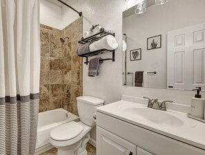 Hair dryer, towels, soap, shampoo