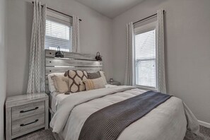 2 bedrooms, desk, iron/ironing board, travel crib
