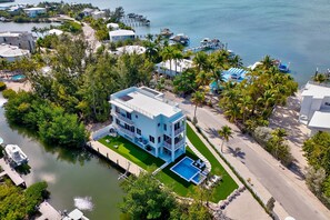 Exterior - Keys Casa: Elegant Waterfront Retreat, Sleeps 16, Elevator, Private Dock, Putt-Putt (Key Largo)