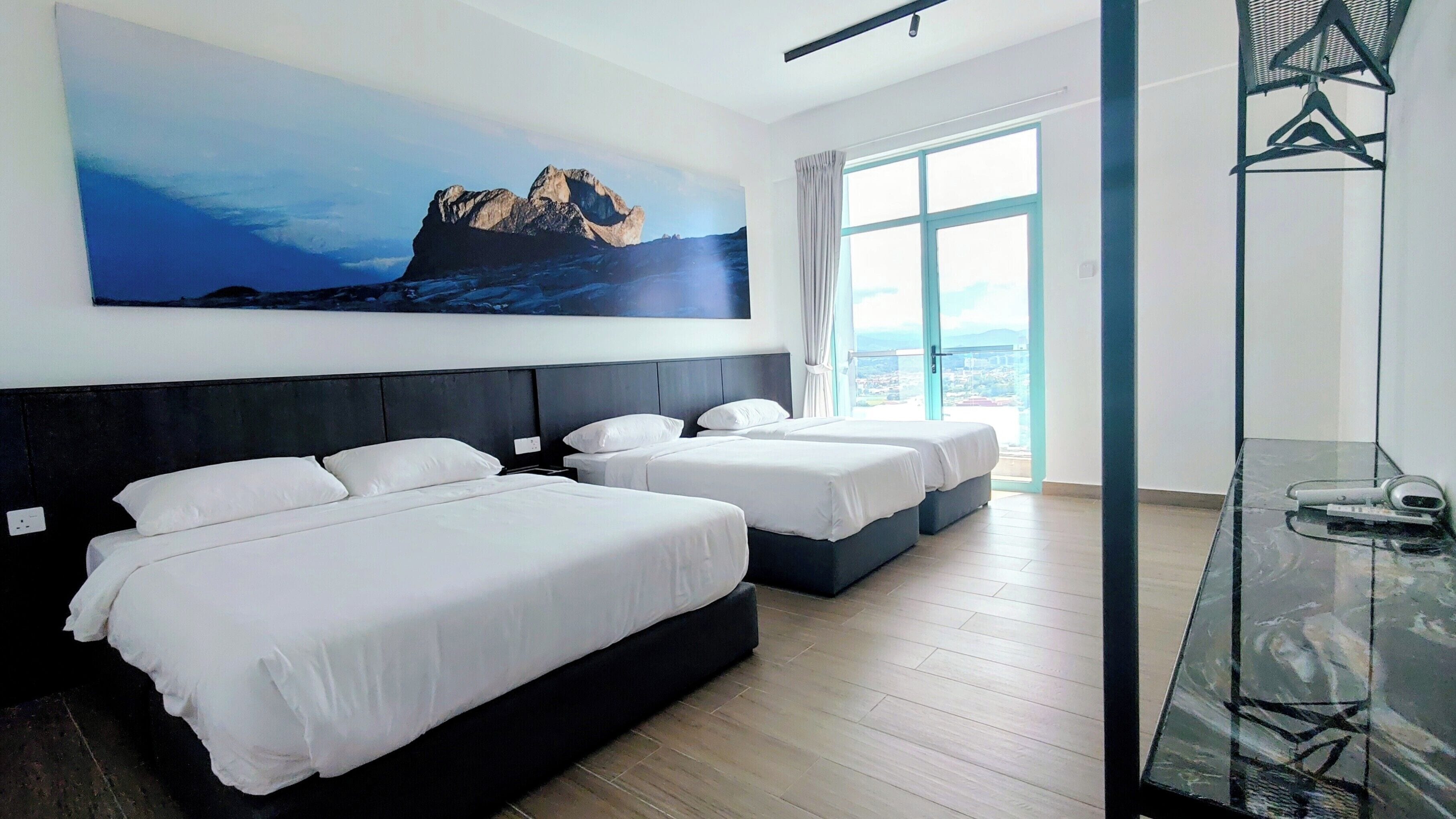 Deluxe Suite, Multiple Beds, Balcony, City View | Blackout drapes, free WiFi, bed sheets