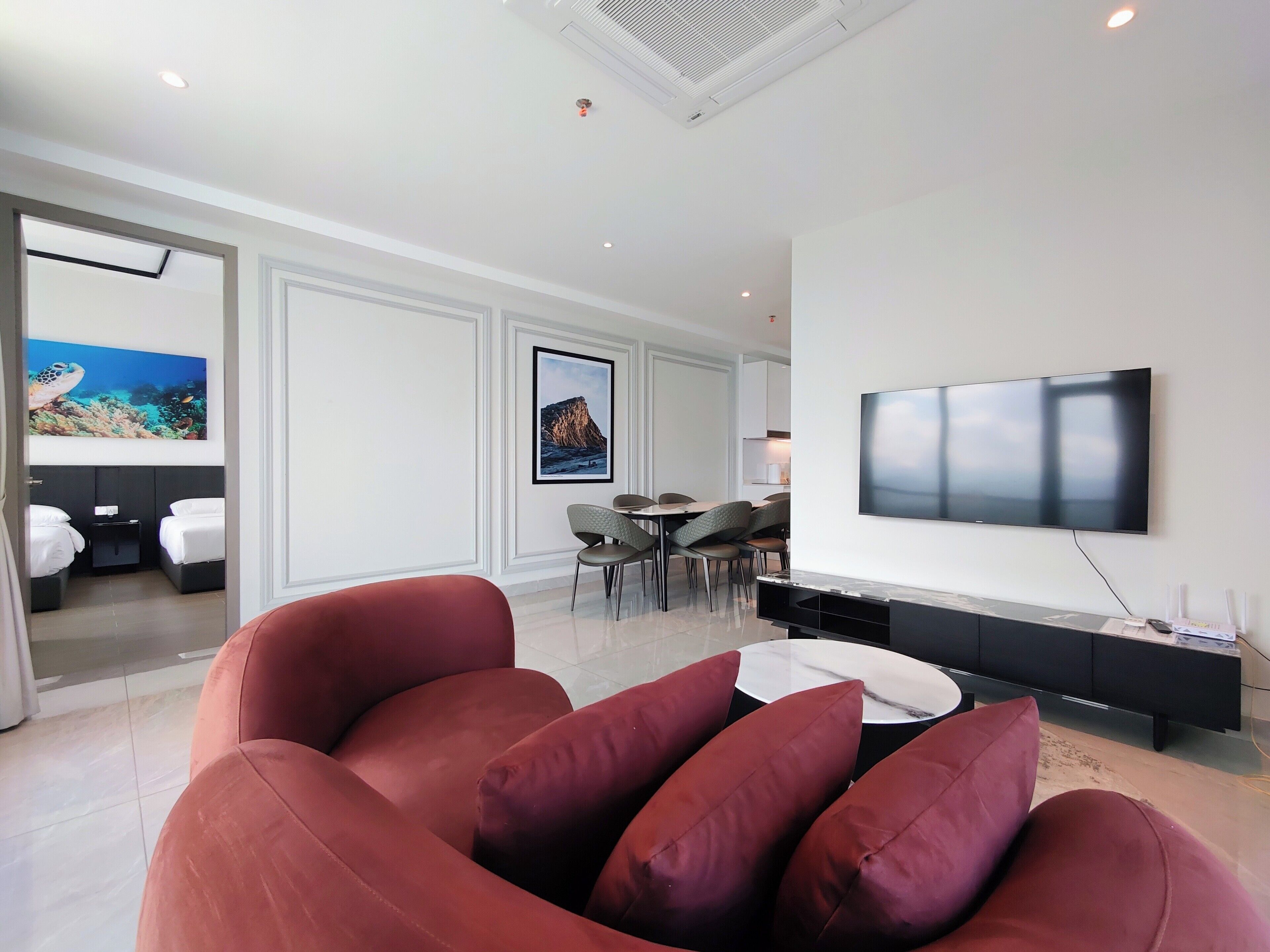 Premier Suite, 2 Bedrooms, Balcony, Sea View | Living area | 55-inch Smart TV with digital channels