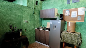 Fridge, microwave, stovetop, cookware/dishes/utensils