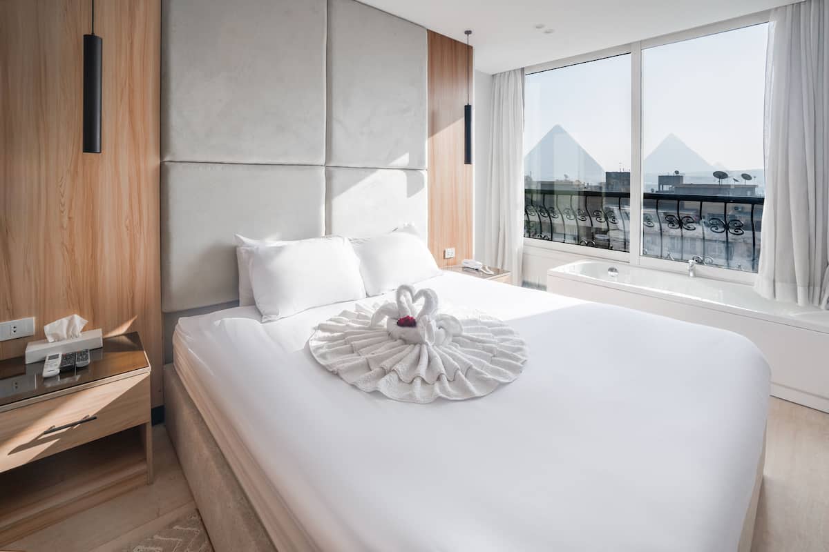 Superior Double Room, Jetted Tub, Mountain View | In-room safe, soundproofing, iron/ironing board, free WiFi