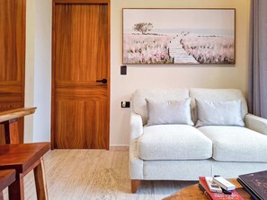 Deluxe-Apartment, Blick auf die Anlage | Wohnbereich