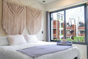 Deluxe Apartment, Resort View | 2 bedrooms, blackout drapes, free WiFi