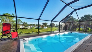 Outdoor pool, a heated pool - Tropical Paradise 3BR/ 2BA- Jetted, heated Pool (North Port)