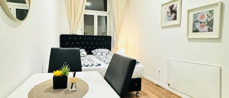 1 bedroom, desk, bed sheets