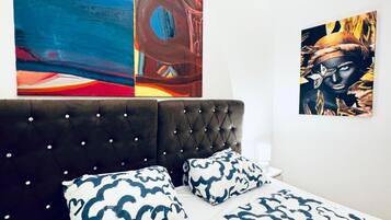1 bedroom, desk, iron/ironing board, bed sheets
