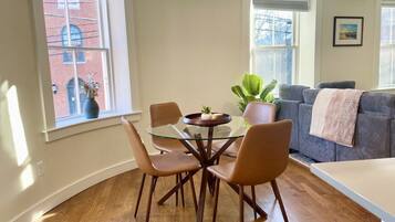 Dining area for 4 with dish ware to feed up to 8