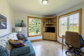 Smart TV, books - Beach Hill Cottage—Waterview PEI Retreat with Wraparound Deck & Family-Friendly (Prince Edward Island)