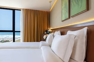 Ropa de cama de alta calidad y minibar
