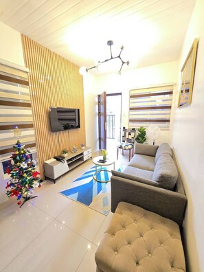 Living area - New Cozy 4BR near Davao Airport BeSTAYcation for Family/Group upto 14 (Davao City)