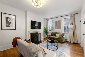 Smart TV - Historic Beacon Hill Charm: Modern Apt w/ Patio, High-Speed WiFi, Steps to Cafes and Boston Commons! (Boston)