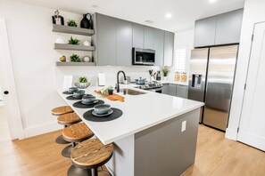 Fridge, microwave, stovetop, dishwasher - Beautiful Waterfront Condo w/ Balcony, Sunsets & Modern Amenities in Wesley Chapel! (Wesley Chapel)