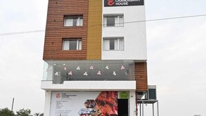 A multi-story hotel with a prominent sign reading "HOTEL THE CHANDIGARH HOUSE". - The Byke Business - Chandigarh House (Bhopal)