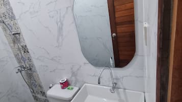 Standard Double Room | Bathroom | Shower, towels, soap, shampoo