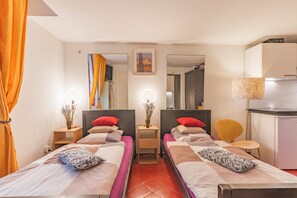1 dormitorio, tabla de planchar con plancha, wifi gratis y ropa de cama