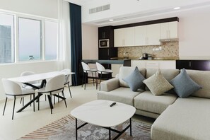 Room, 1 Bedroom, Sea View | Living area | 50-inch Smart TV with satellite channels - Jannah Executive Hotel Apartments (Abu Dhabi)