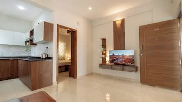 Standard Apartment, 1 Queen Bed | Living area | LED TV