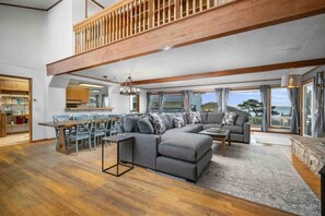 TV, books - Stunning Ocean View, Pet Friendly, Deck w/Hot Tub, Pool Table, Foosball, 1 Block to Beach (Lincoln City)