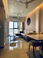 1 BHK Queen | Área de estar