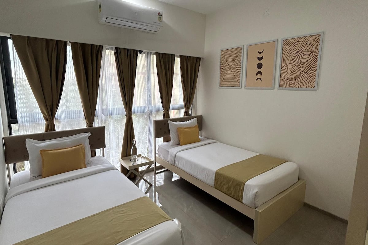 Deluxe Twin (Private, non-attached washroom) in a 2BHK apartment